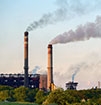 Racial Disparities in Pollution Exposure and Employment at U.S. Industrial Facilities